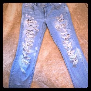 Distressed light wash American eagle jeans